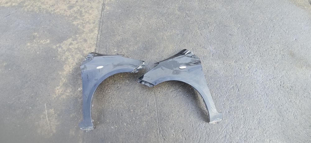 Błotnik lewy prawy  Toyota Yaris II  209