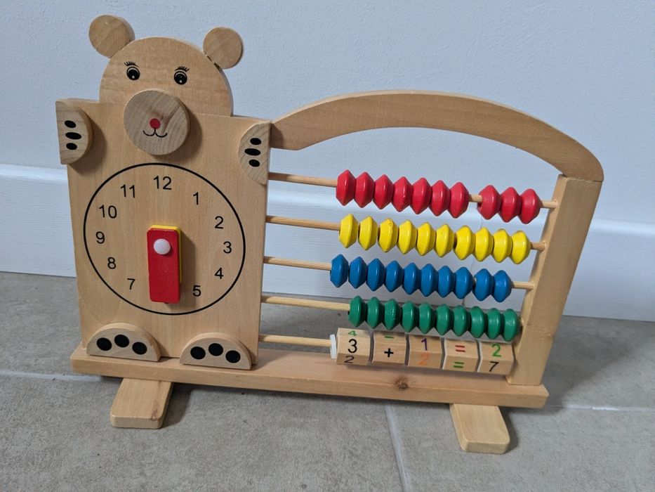 Дерев'яна екоіграшка рахівниця з годинником вживане