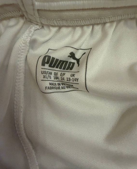 Шорти — це Puma AC Milan 2024-25 Home Shorts для дітей на 13-14 років