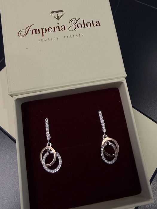 Срівбні сережки з золотими вставками та фіанітами