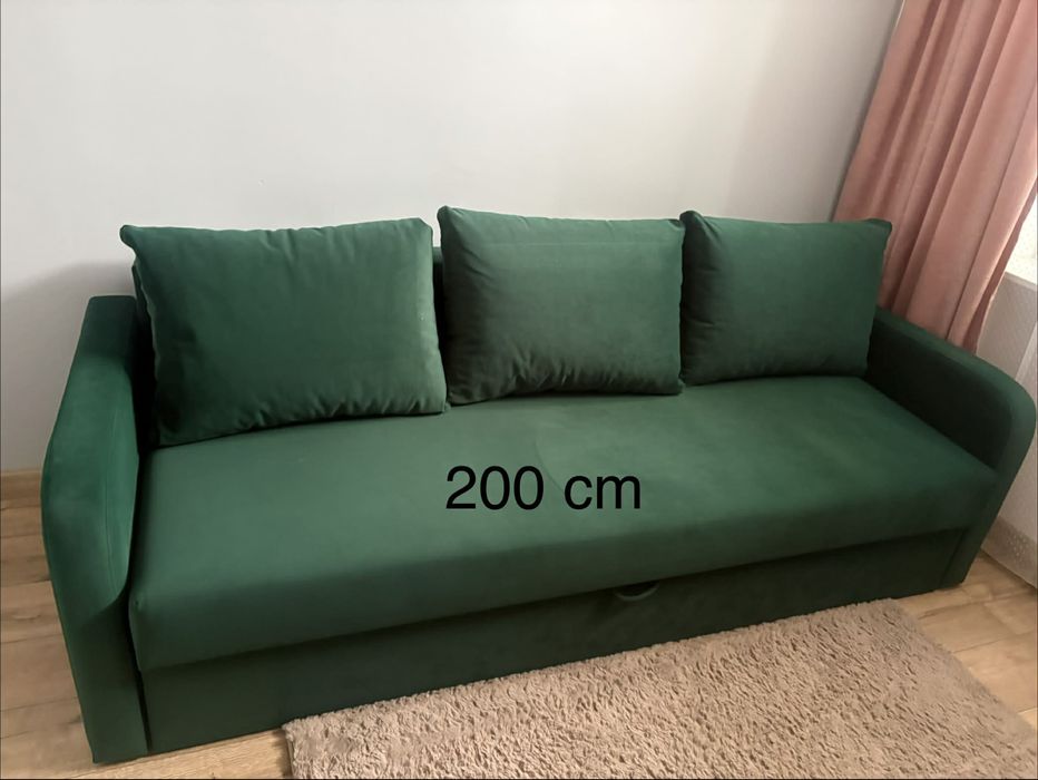 Kanapa rozkladana w kolorze butelkowa zieleń