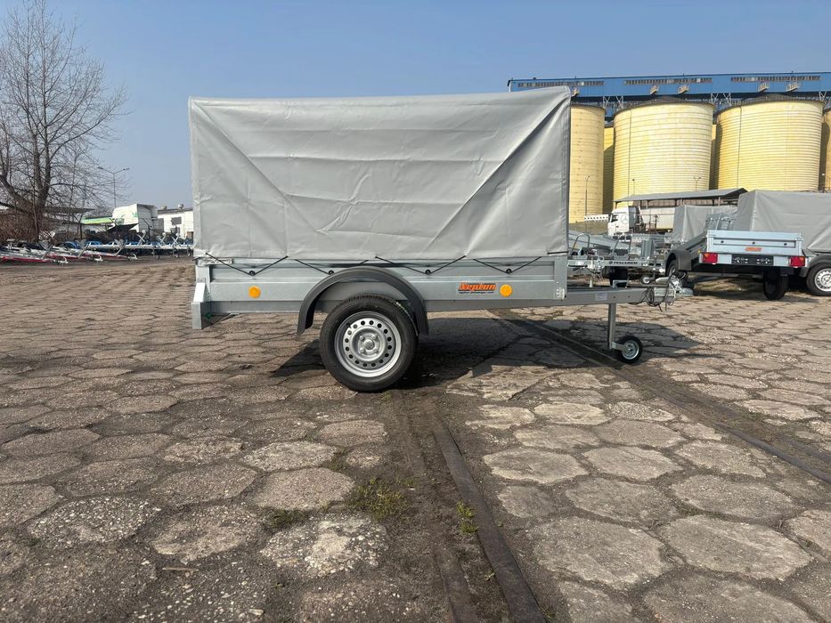 Neptun 202 PTD  Nowa przyczepka samochodowa Neptun 202 PTD stelaż z plandeką Brzeg