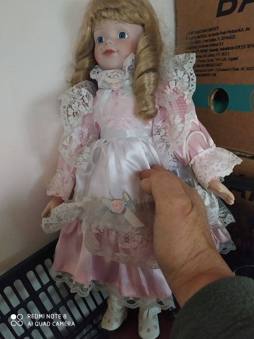 Bonecas de porcelana em bom estado