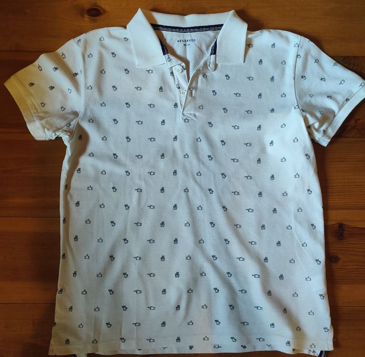 Біле поло "Reserved".