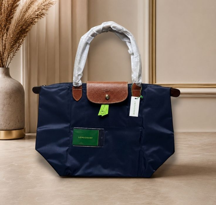 Saco Longchamp novo. Cores disponíveis azuis ou pretas