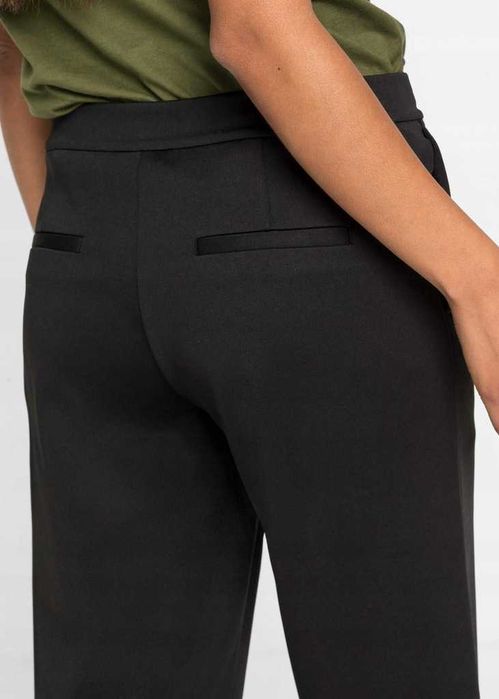 8) Czarne spodnie 46