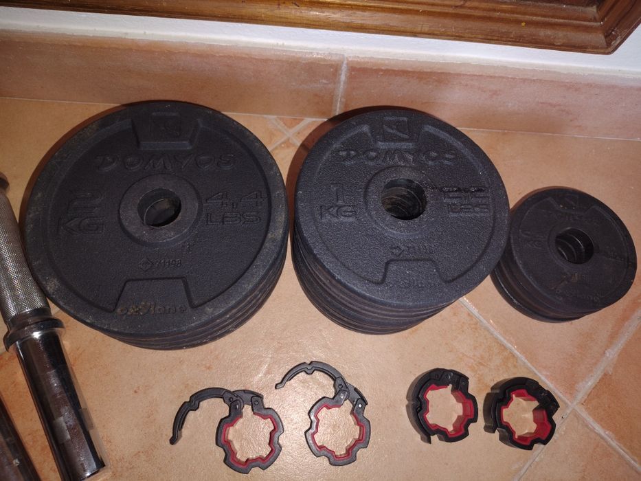 Conjunto de pesos para musculação com bloqueadores