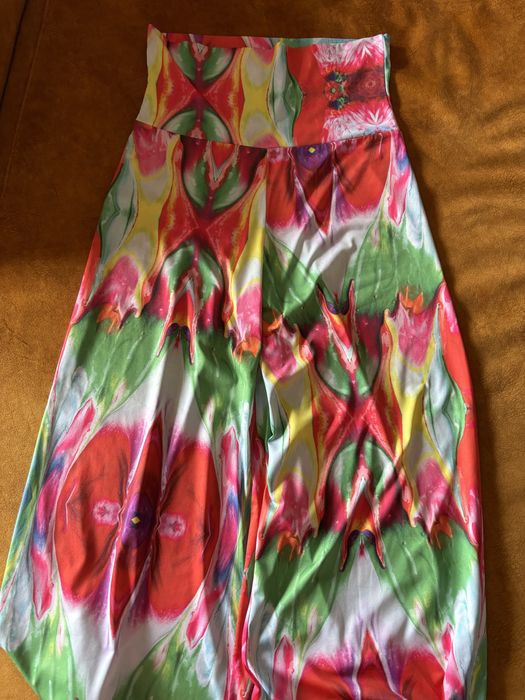 Calcas girissimas de perna larga  , a vestir tem elasticidade M  e  L