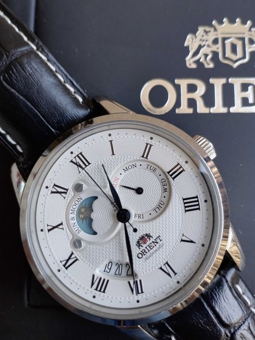 Zegarek Orient Sun and Moon FET0T002S0 automatyczny. Z papierami