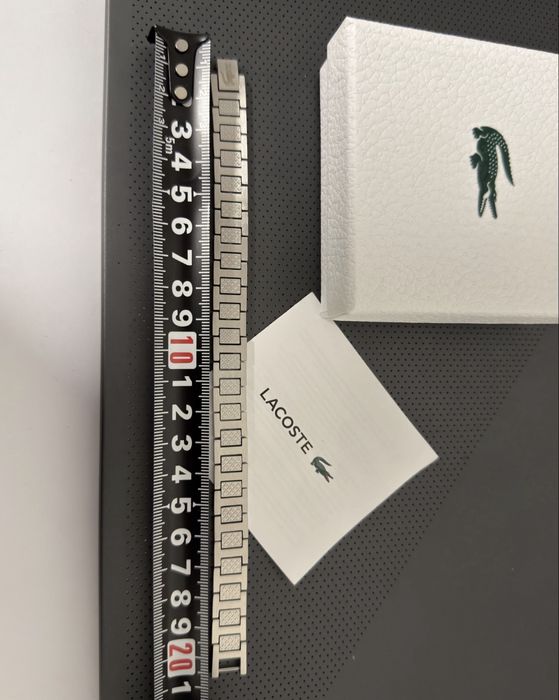 Браслет Lacoste в упаковці. Довжина 21 см.