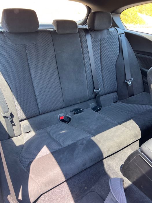 BMW 116 coupé com teto de abrir.