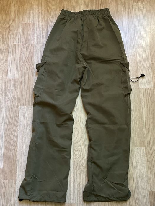 Темно зелені штани карго