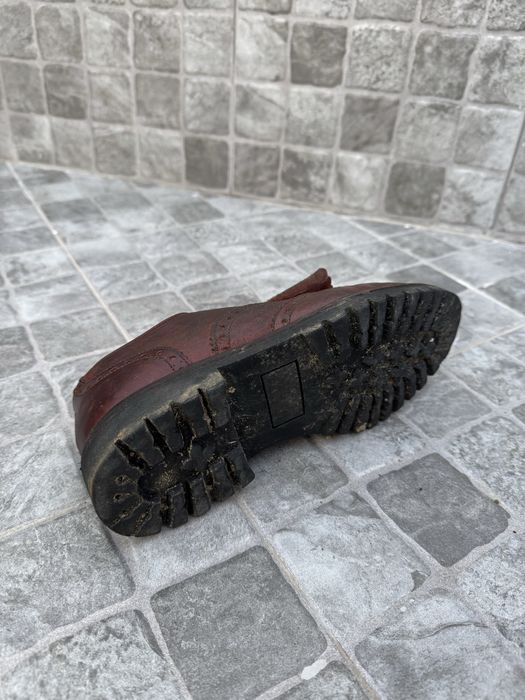 Sapatos de forcado em pele