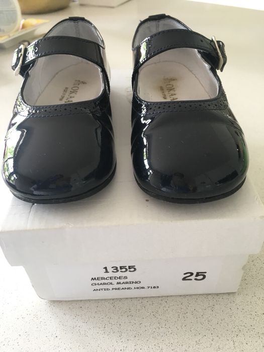 Sapatos em pele