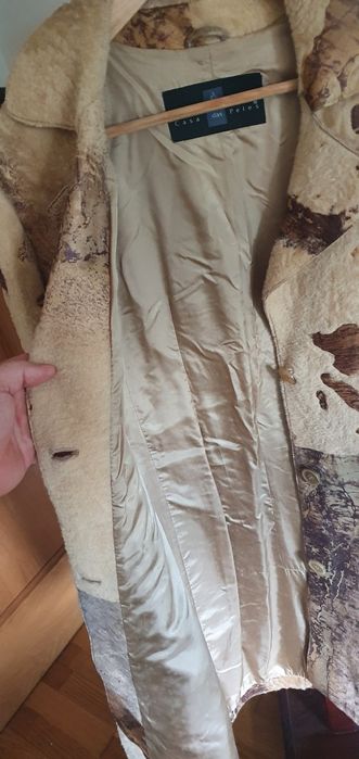 Casaco comprido de pele autêntica, nunca usado.