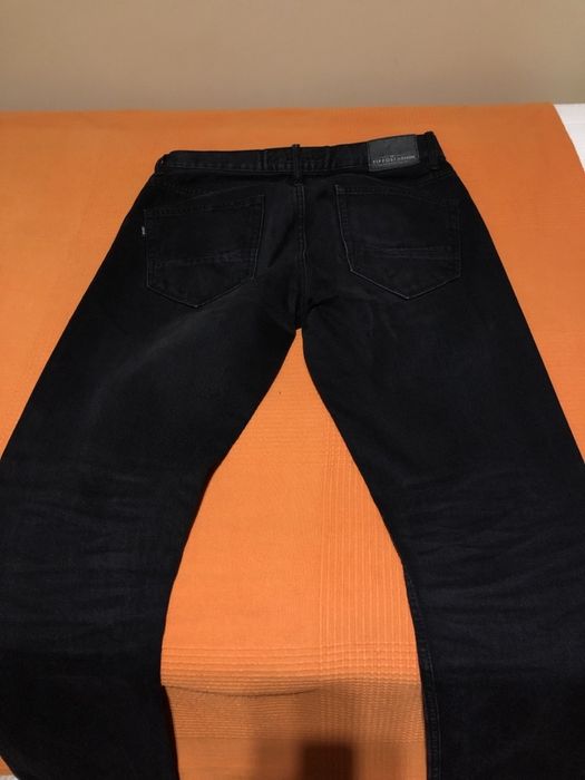 Calças Tiffosi pretas 33/34 equivalente 42