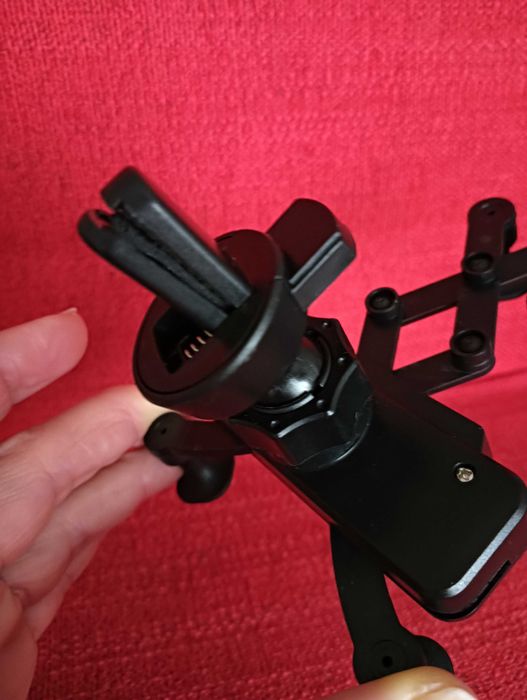 Suporte manual ajustável de telemóvel para viatura