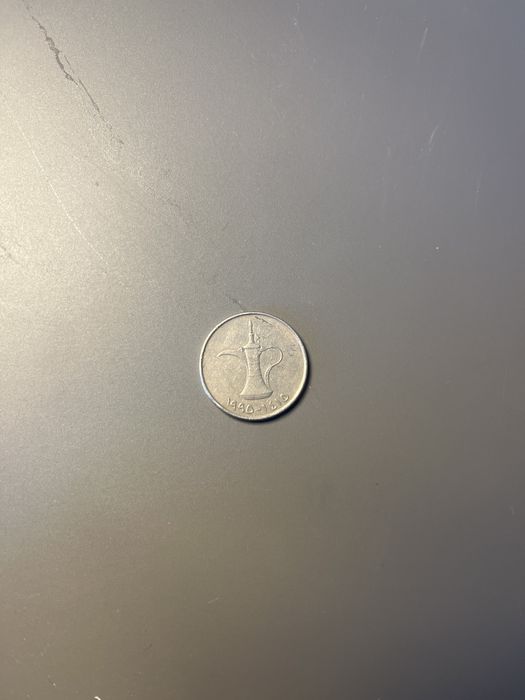Moeda antiga dos United Arab Emirates de 1990