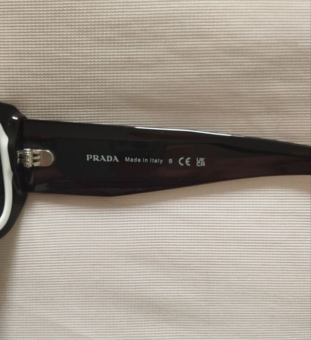 Óculos de sol Prada como novos