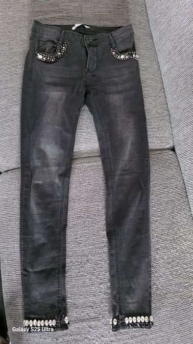 Damskie jeansy skinny z kryształami 38