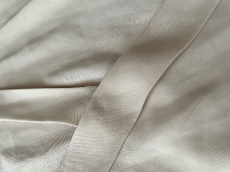 Damski kremowy kombinezon