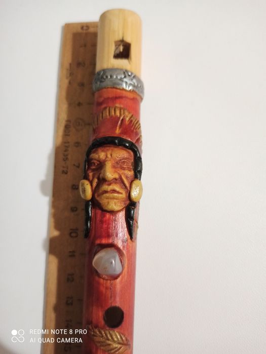 Перуанская бамбуковая флейта с изображением индианца