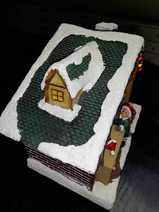 Casa  do Pai Natal em resina com Luz + Musica e Movimento. Usada