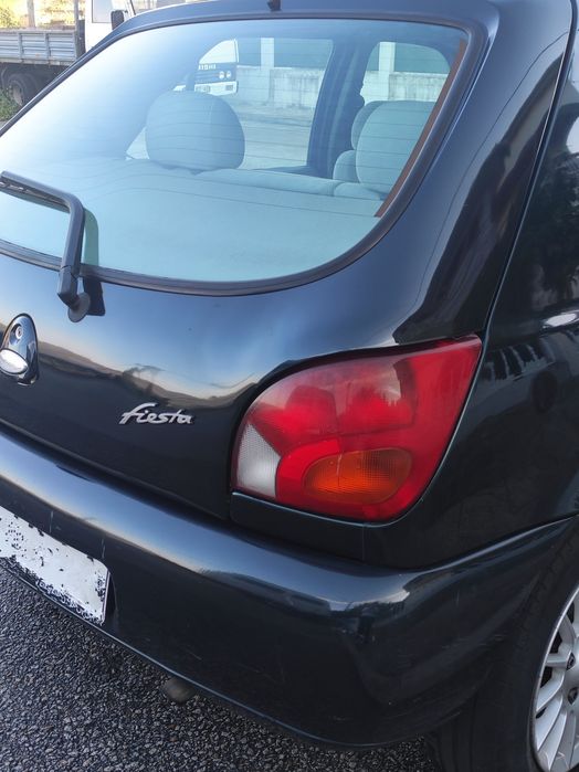 Ford Fiesta 1.25 Ghia — photo 4