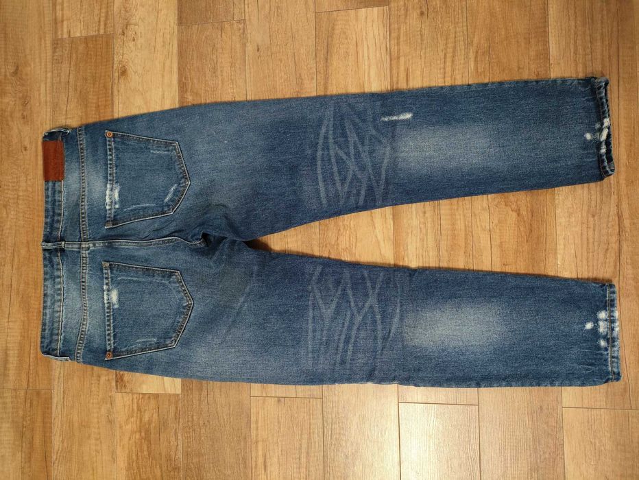 Jeansy z prostą nogawką MANGO