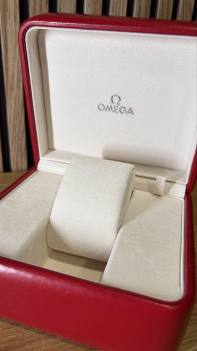 Omega caixa como nova