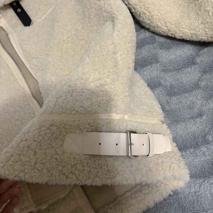 Дубльонка молочного кольору