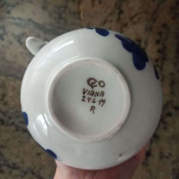 Relógio de parede e jarros de Viana