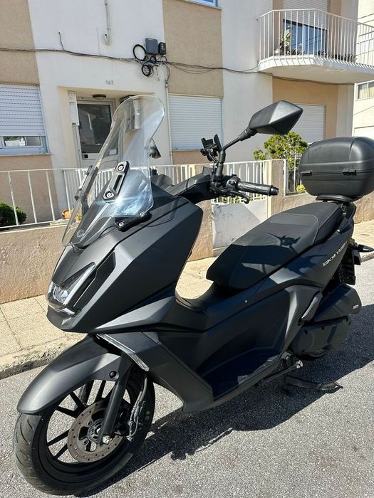 Mota 125  Kymco Sky Town