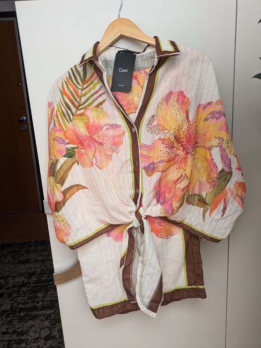 Fato CAWÉ com etiqueta