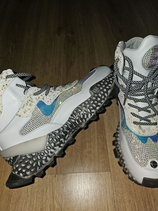 Ténis bota como novos