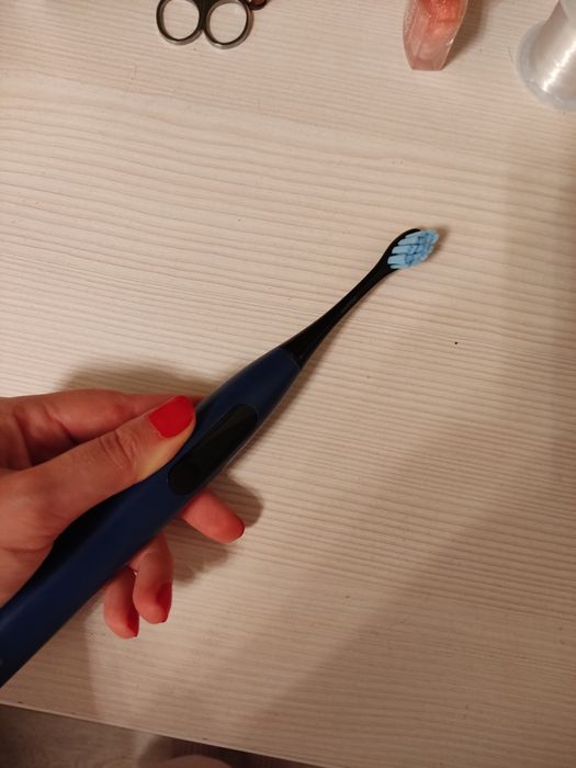 Електрична зубна щітка oclean.