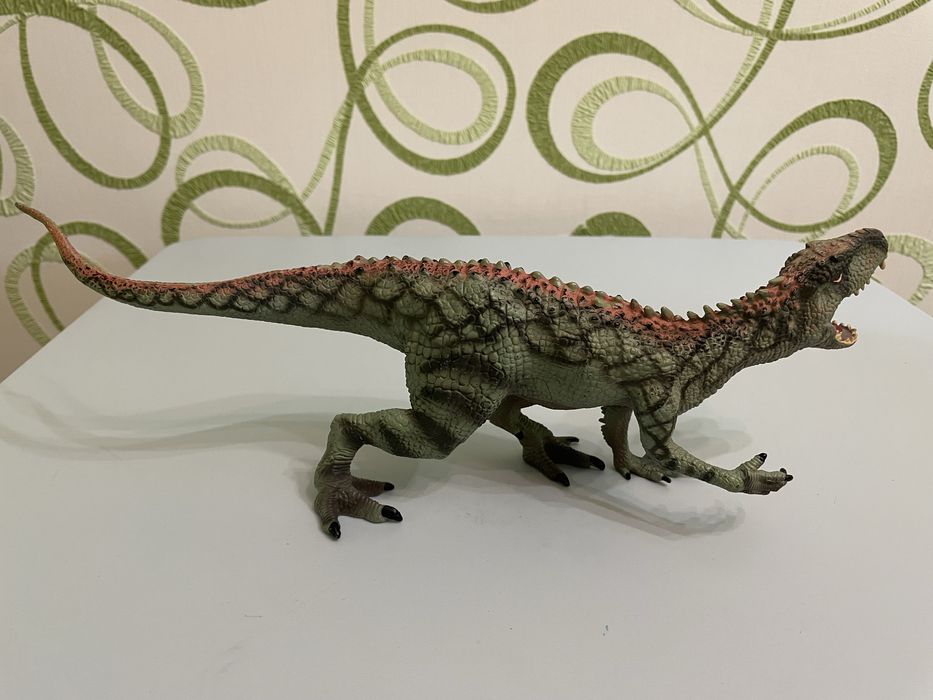 Динозавр іграшка