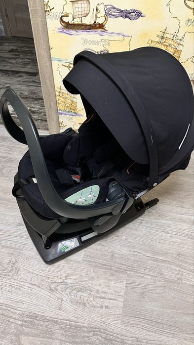 Автокрісло , автолюлька 0+ Stokke з базою izofix
