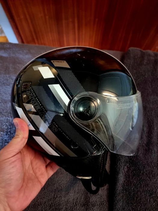 Capacete semi novo
