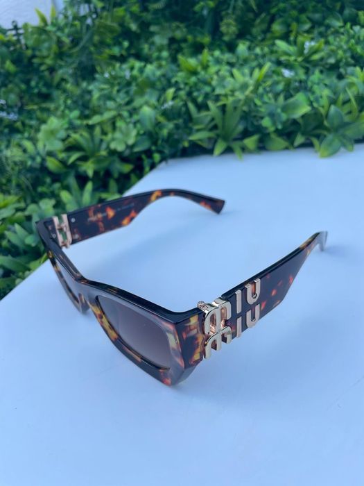 Oculos de sol novos