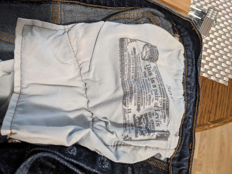 Spodnie jeansowe Levis 501 W31 L30 przecierany granatowy