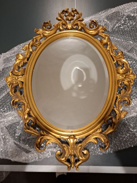 Espelho oval moldura dourada