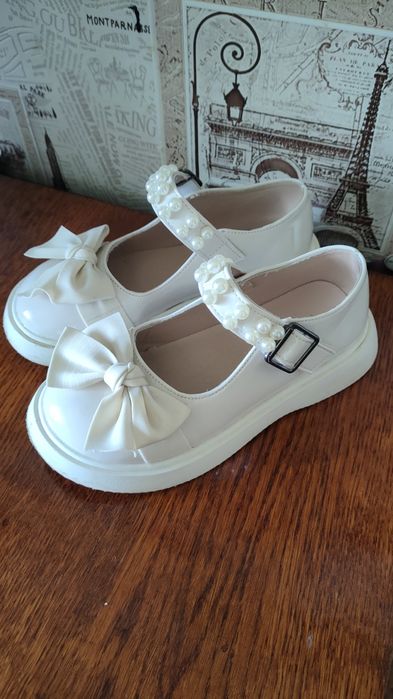 Туфельки на дівчинку