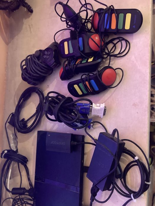 Play Station 2 em bom estado com 4 jogos