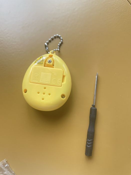 Bichinho Virtual Amarelo -  Estilo Tamagotchi