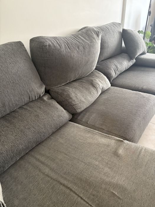 Sofá cinzento XL com baú e encostos reclináveis (funcional e honesto)