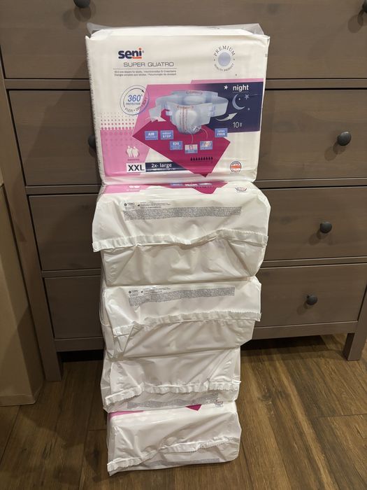 5 paczek pieluch Seni super Quatro XXL