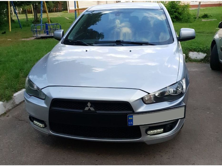 Mitsubishi Lancer X Подіум під номер чорний мат
