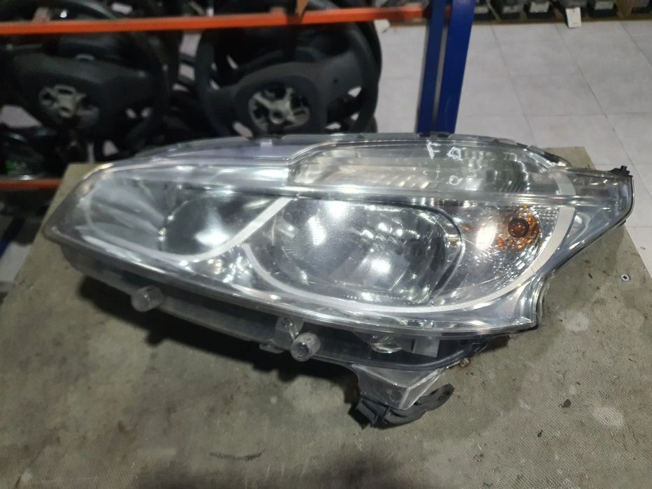FAROL ESQUERDO PEUGEOT 208 / 9802221880