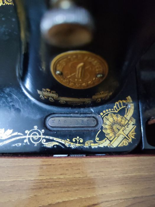 Máquina de costura singer